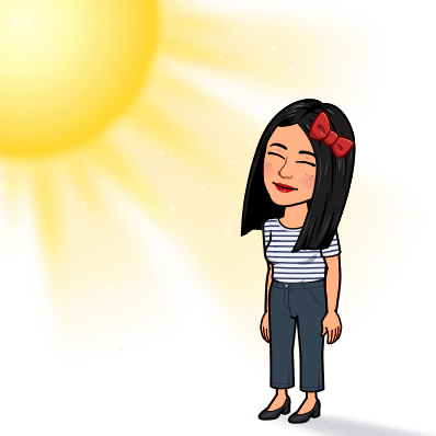 Emoji de Silvia, creado con la aplicación Bitmoji, en la que está delante del sol 